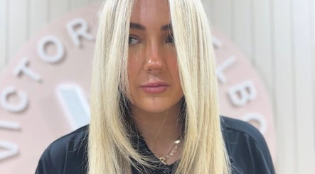 Blonde hair styled at Victoria Melbourne Stylist in Melbourne, Victoria, AU.
