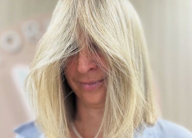 Stylish blonde haircut at Victoria Melbourne Stylist in Melbourne, Victoria, AU.