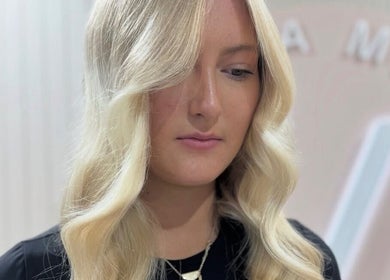 Elegant blonde hairstyle at Victoria Melbourne Stylist, Melbourne, Victoria, AU.