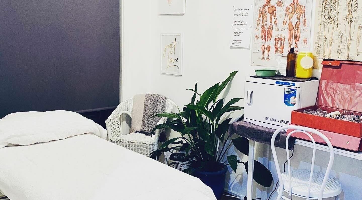 Relaxing massage room at Cindy’s Remedial Massage in Shellharbour, New South Wales, AU with bed and plants.