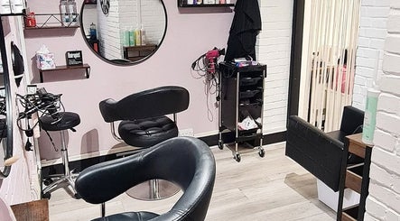 Chic beauty salon interior at Glow & Co. | Brows And Beauty, Wallingford, England, GB with stylish seating.