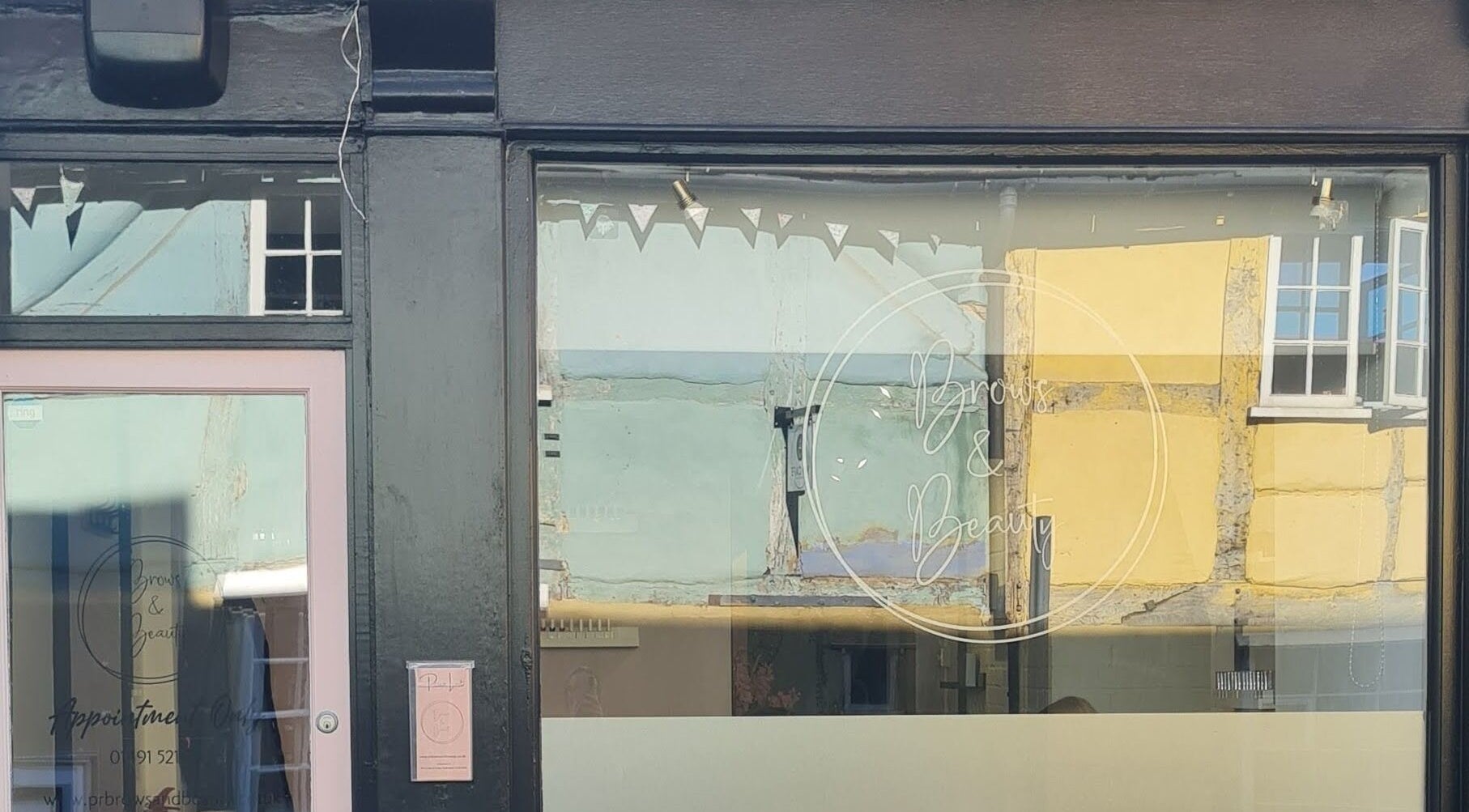 Exterior of Glow & Co. | Brows And Beauty in Wallingford, England, GB with elegant storefront.