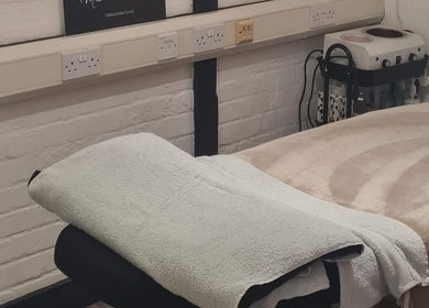 Relaxing treatment room at Glow & Co. | Brows And Beauty, Wallingford, England, GB, offering premium beauty services.