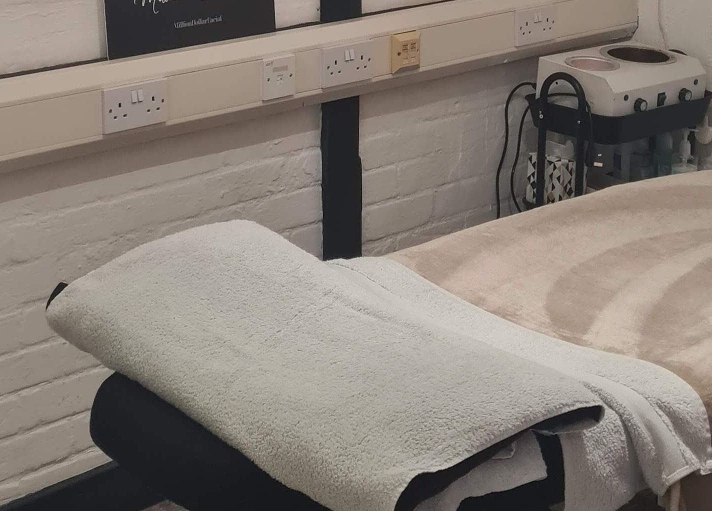 Relaxing treatment room at Glow & Co. | Brows And Beauty, Wallingford, England, GB, offering premium beauty services.