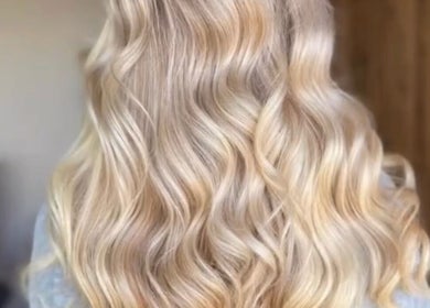 Blonde wavy hairstyle at Hair by Jasmine, Carrick-On-Shannon, Roscommon, IE. Perfect for enhancing natural beauty.