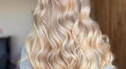 Blonde wavy hairstyle at Hair by Jasmine, Carrick-On-Shannon, Roscommon, IE. Perfect for enhancing natural beauty.