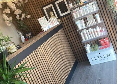 Chic reception with products at Hair by Jasmine, Carrick-On-Shannon, Roscommon, IE. Modern and inviting decor.