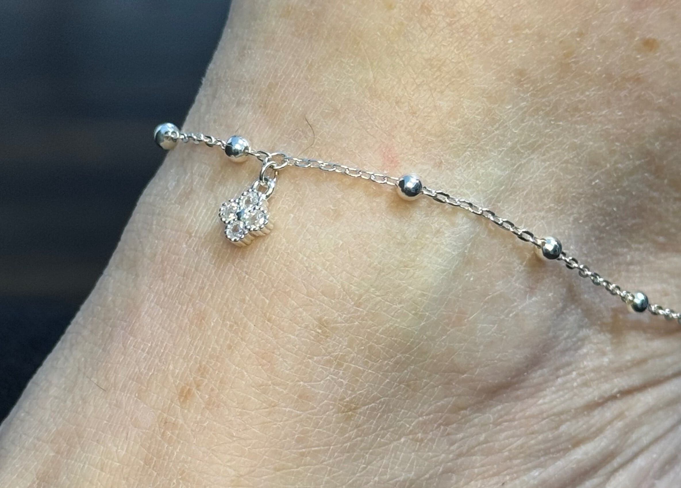 Elegant anklet with charm from Whitehead & Booth Salon & Permanent Jewellery, Sheffield, England, GB.
