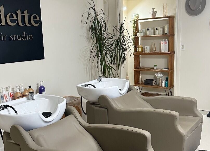 Relaxing wash stations at Odette Hair Studio, Prince Edward, Ontario, CA, offering premium beauty services.