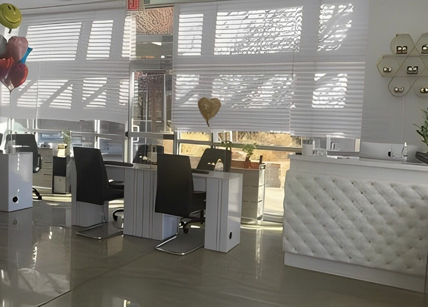 Elegant nail salon interior at BTS Nails & Spa in Aurora, Colorado, US featuring modern decor and workstations.