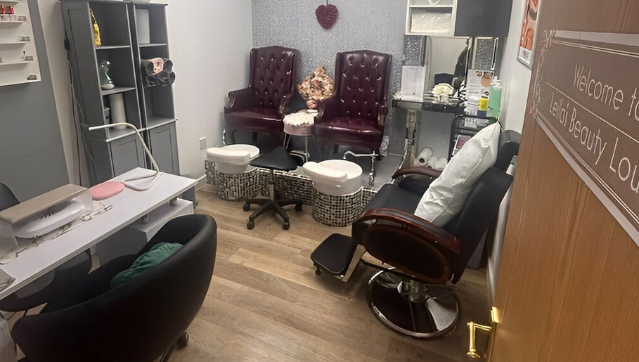 Leila’s Beauty Lounge cozy spa room with plush chairs and pedicure stations in Birmingham, England, GB.