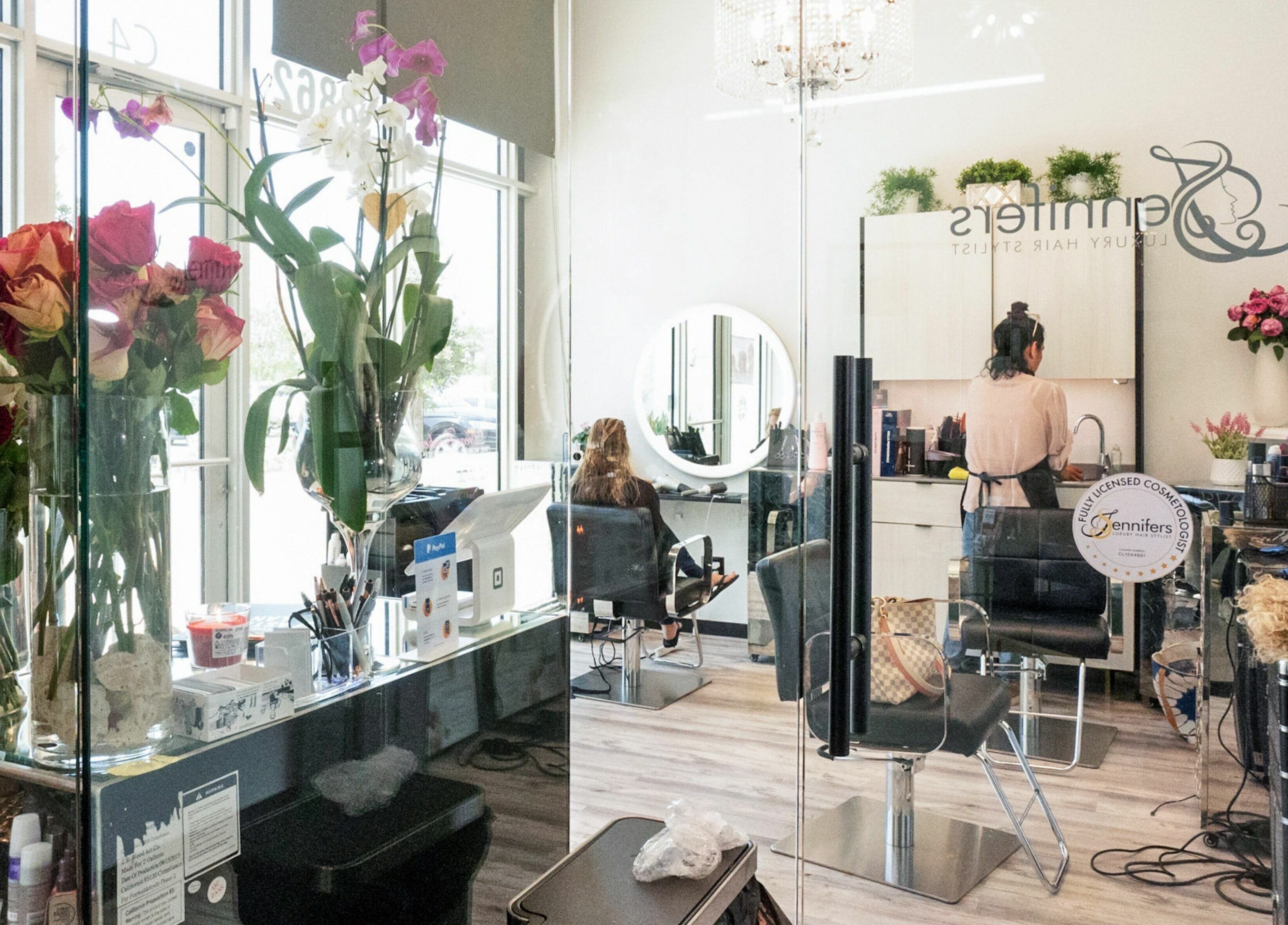 Elegant salon interior at Jennifer The Hairstylist in Delray Beach, Florida, US, showcasing a chic, modern design.