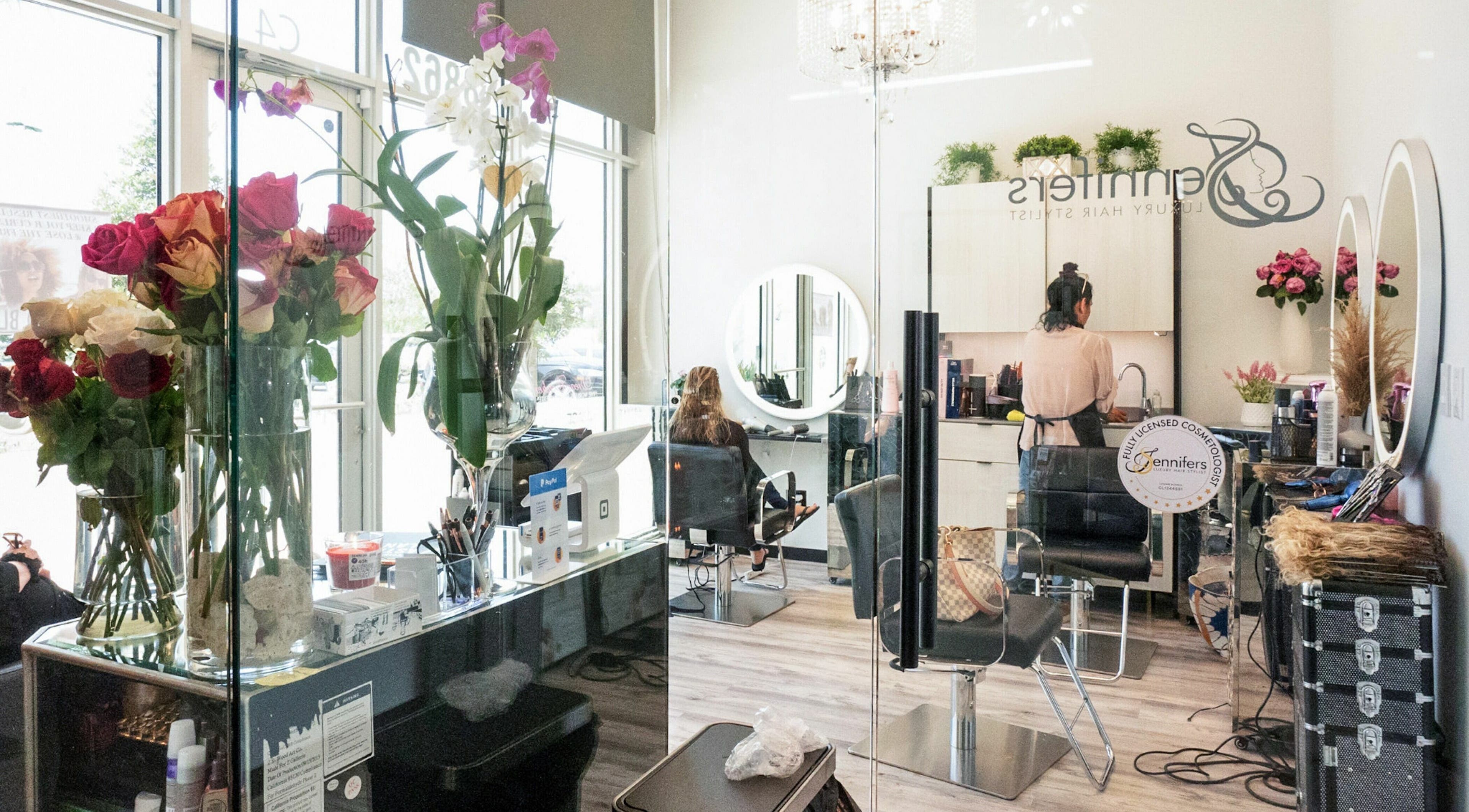 Elegant salon interior at Jennifer The Hairstylist in Delray Beach, Florida, US, showcasing a chic, modern design.