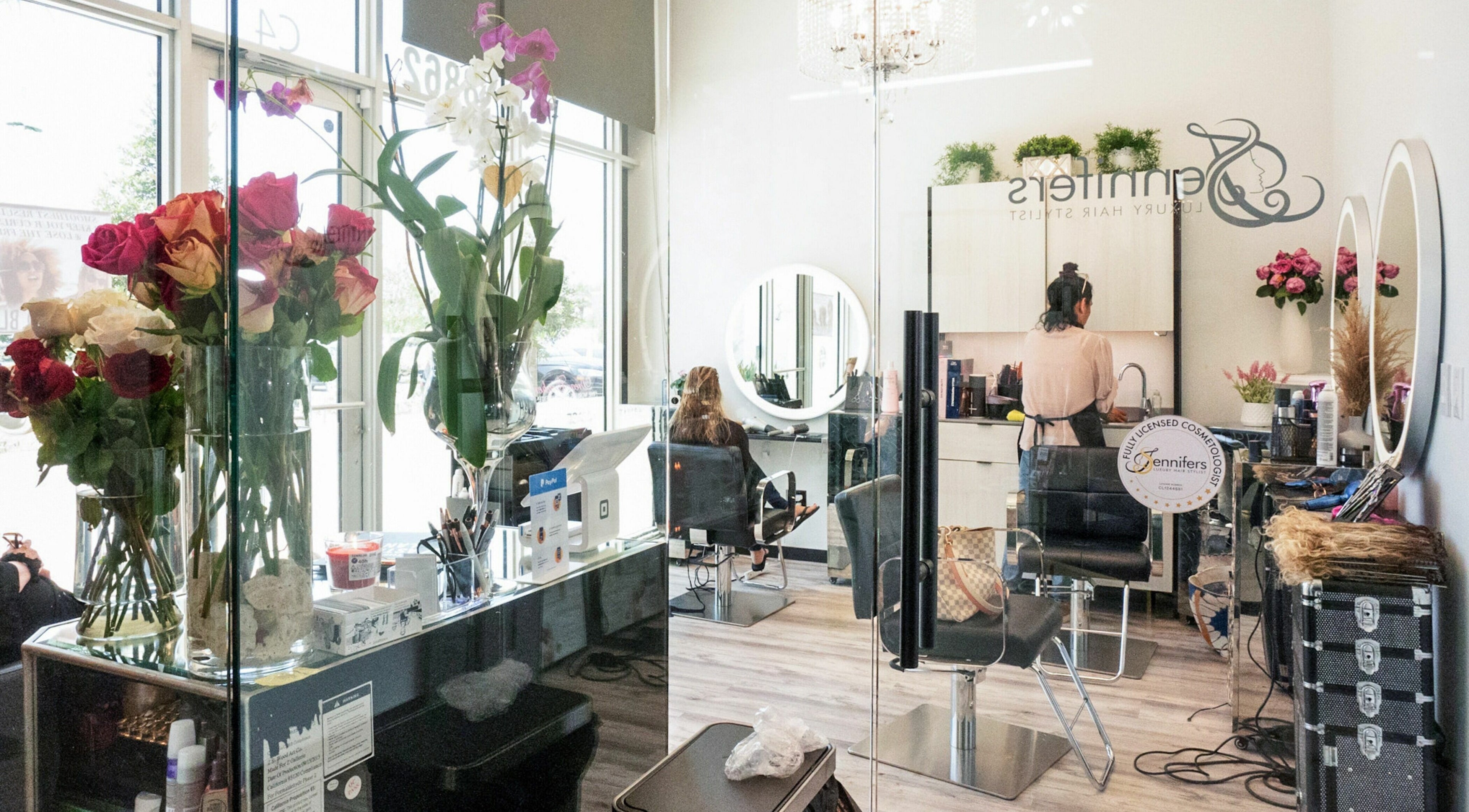 Elegant salon interior at Jennifer The Hairstylist in Delray Beach, Florida, US, showcasing a chic, modern design.