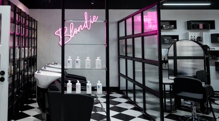 Modern salon interior at Flirt Hair and Beauty Bar in Pretoria, Gauteng, ZA with chic decor and hair products.