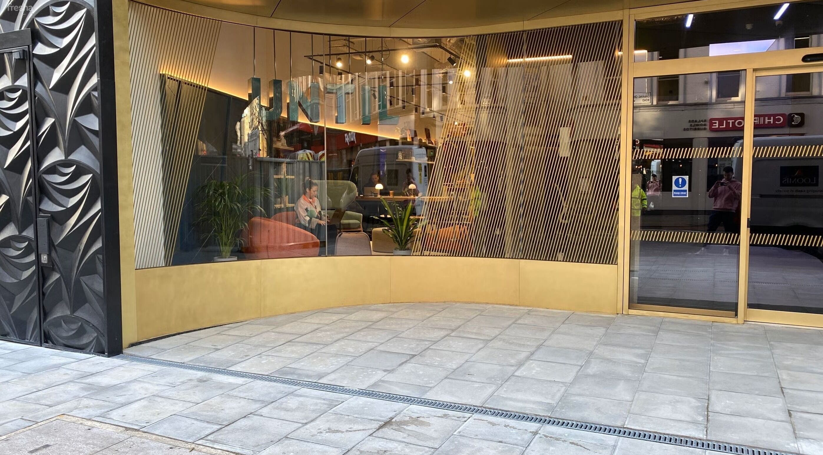 Stylish exterior of Wild Man Massage - Until Canary Wharf in London, England, GB with modern decor.