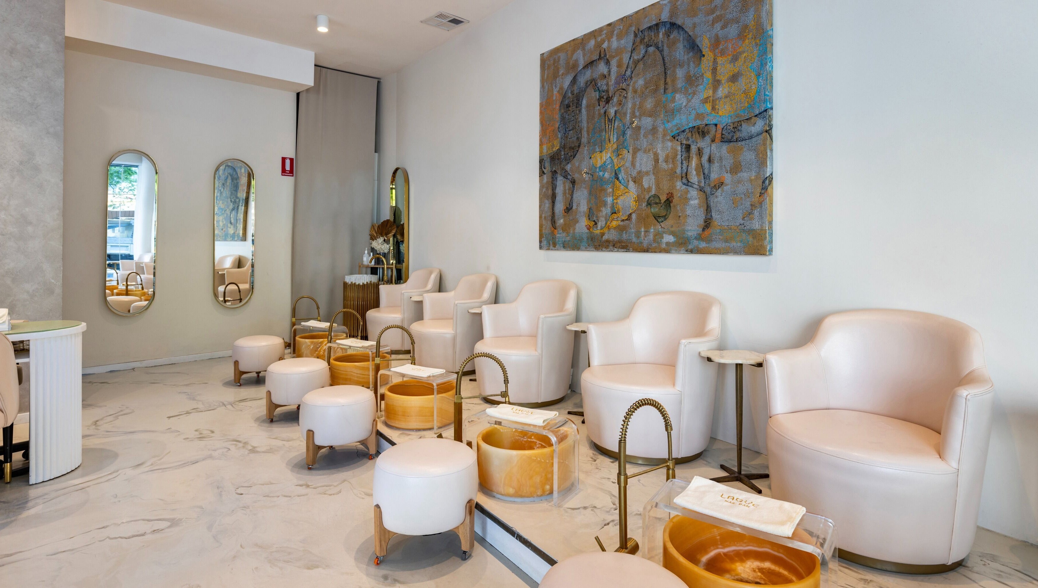 Chic interior of Laque Nail Bar - Double Bay, featuring plush seating and elegant decor in Double Bay, NSW, AU.