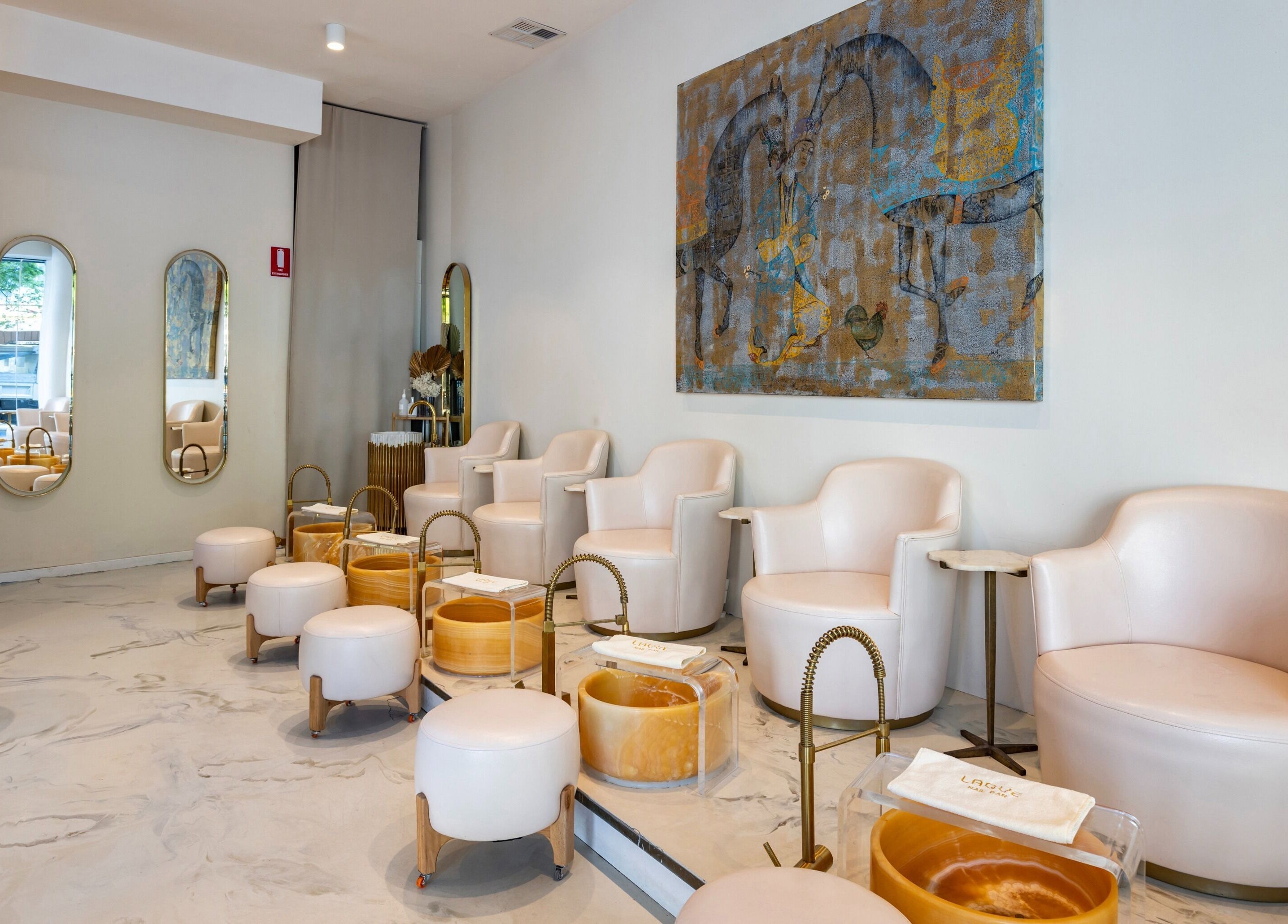 Chic interior of Laque Nail Bar - Double Bay, featuring plush seating and elegant decor in Double Bay, NSW, AU.