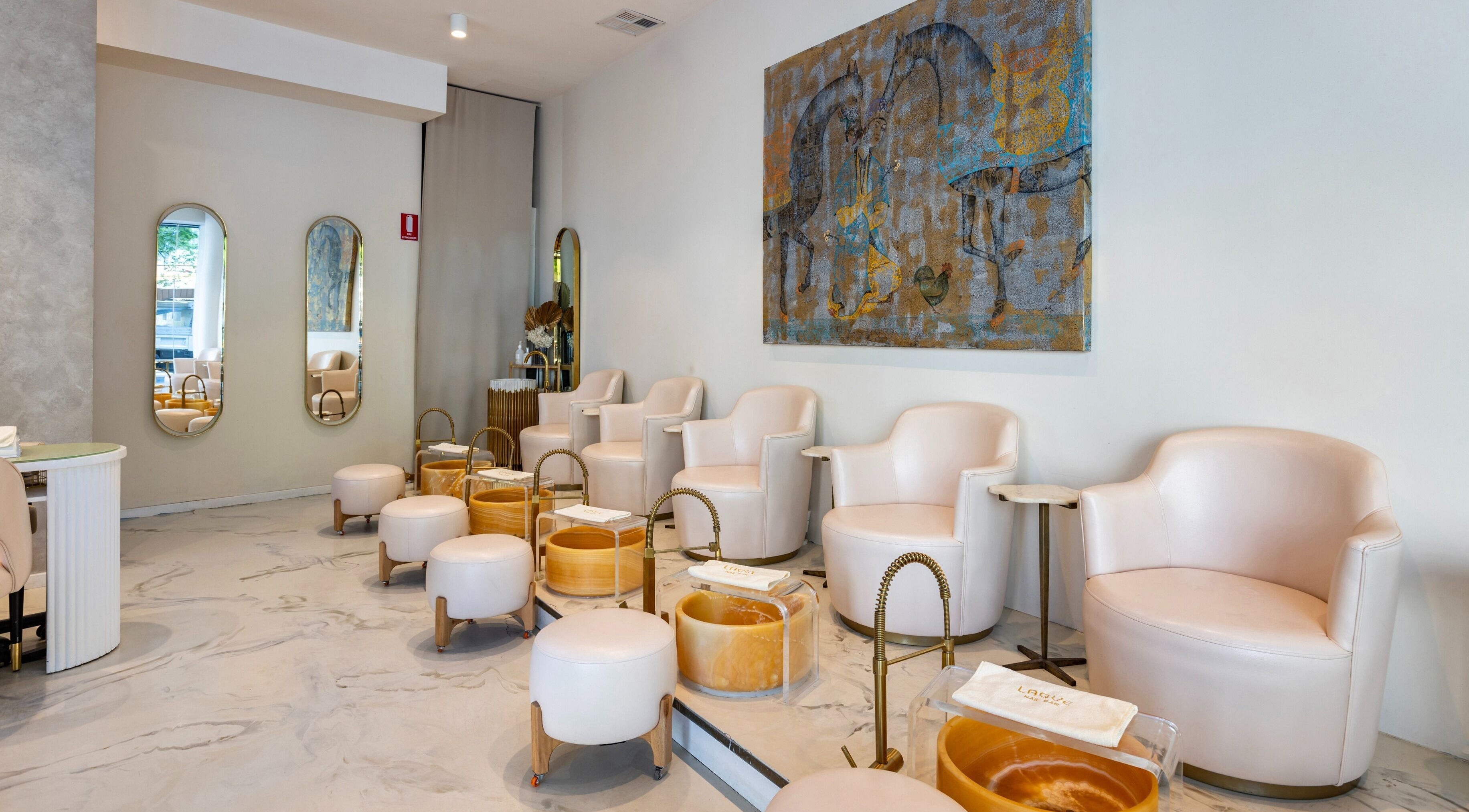 Chic interior of Laque Nail Bar - Double Bay, featuring plush seating and elegant decor in Double Bay, NSW, AU.