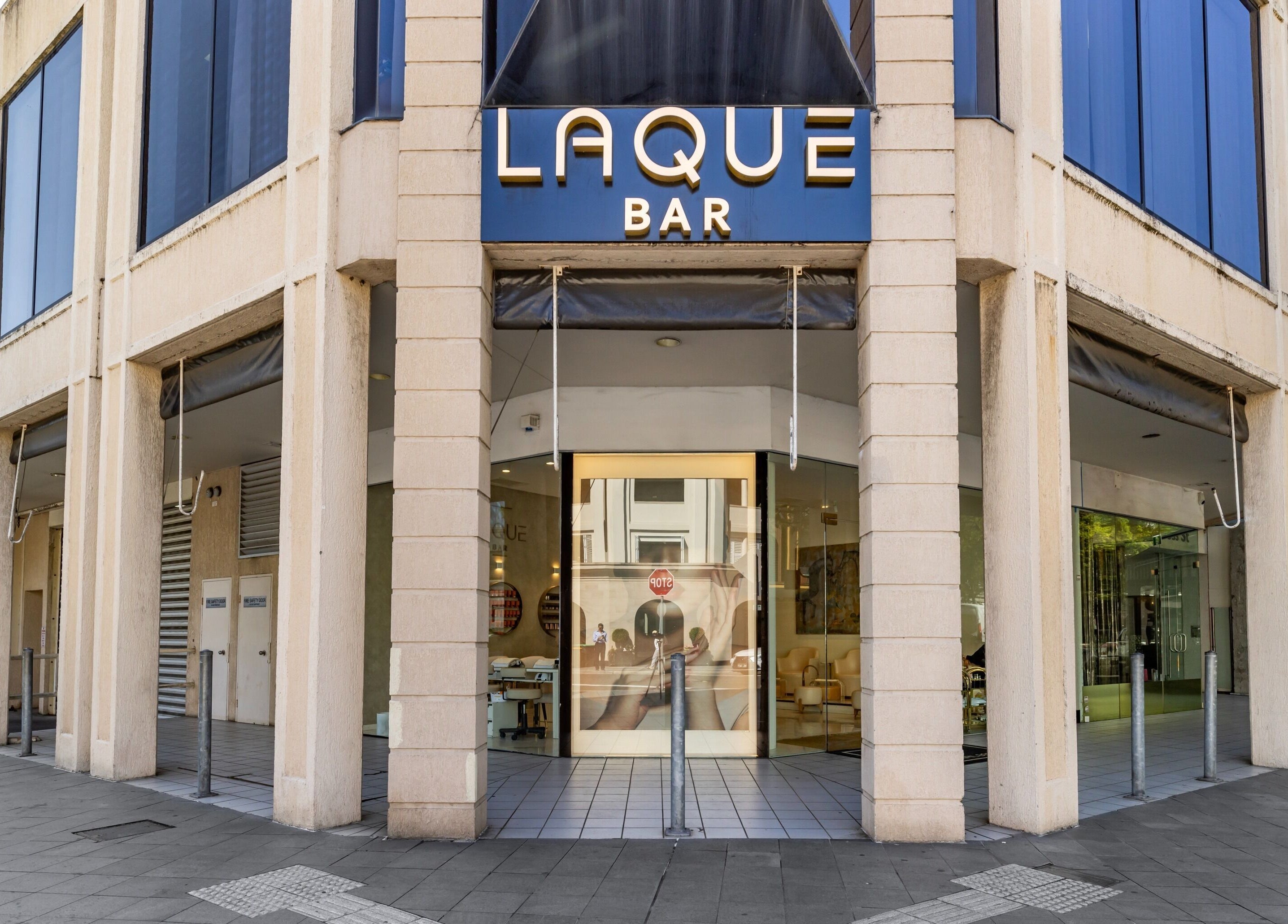 Front entrance of Laque Nail Bar - Double Bay, showcasing its modern exterior in Double Bay, NSW, AU.