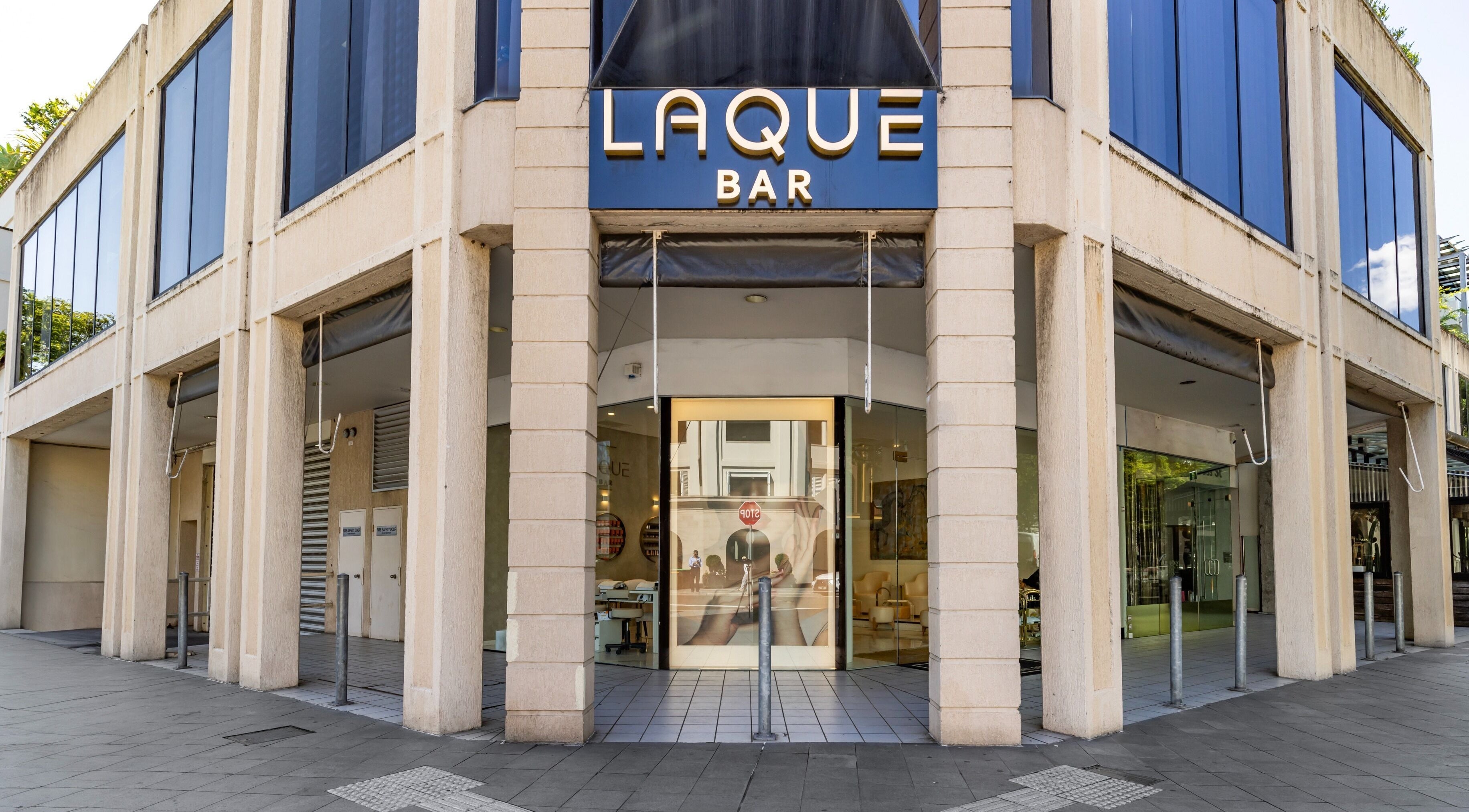 Front entrance of Laque Nail Bar - Double Bay, showcasing its modern exterior in Double Bay, NSW, AU.