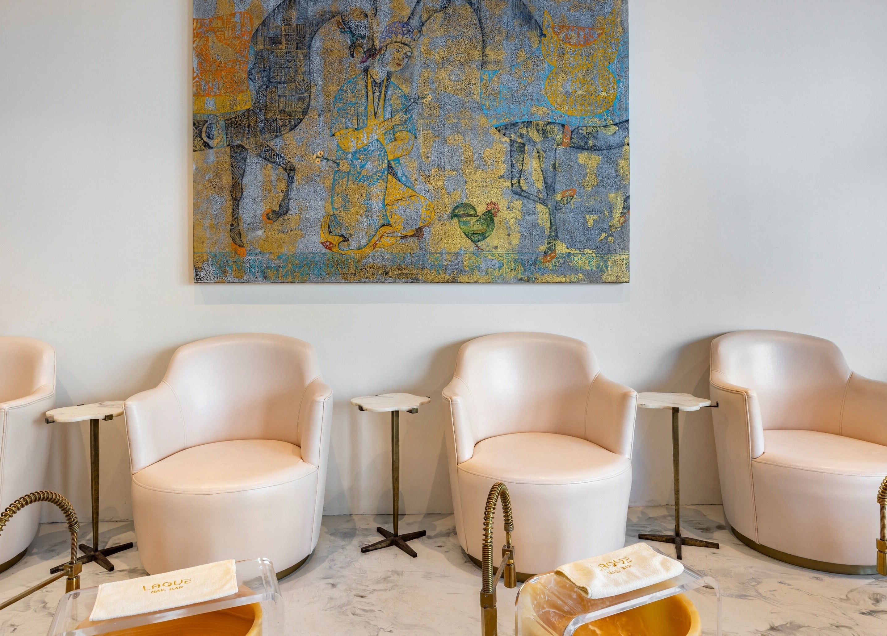 Elegant seating inside Laque Nail Bar - Double Bay, with chic decor. Located in Double Bay, NSW, AU.