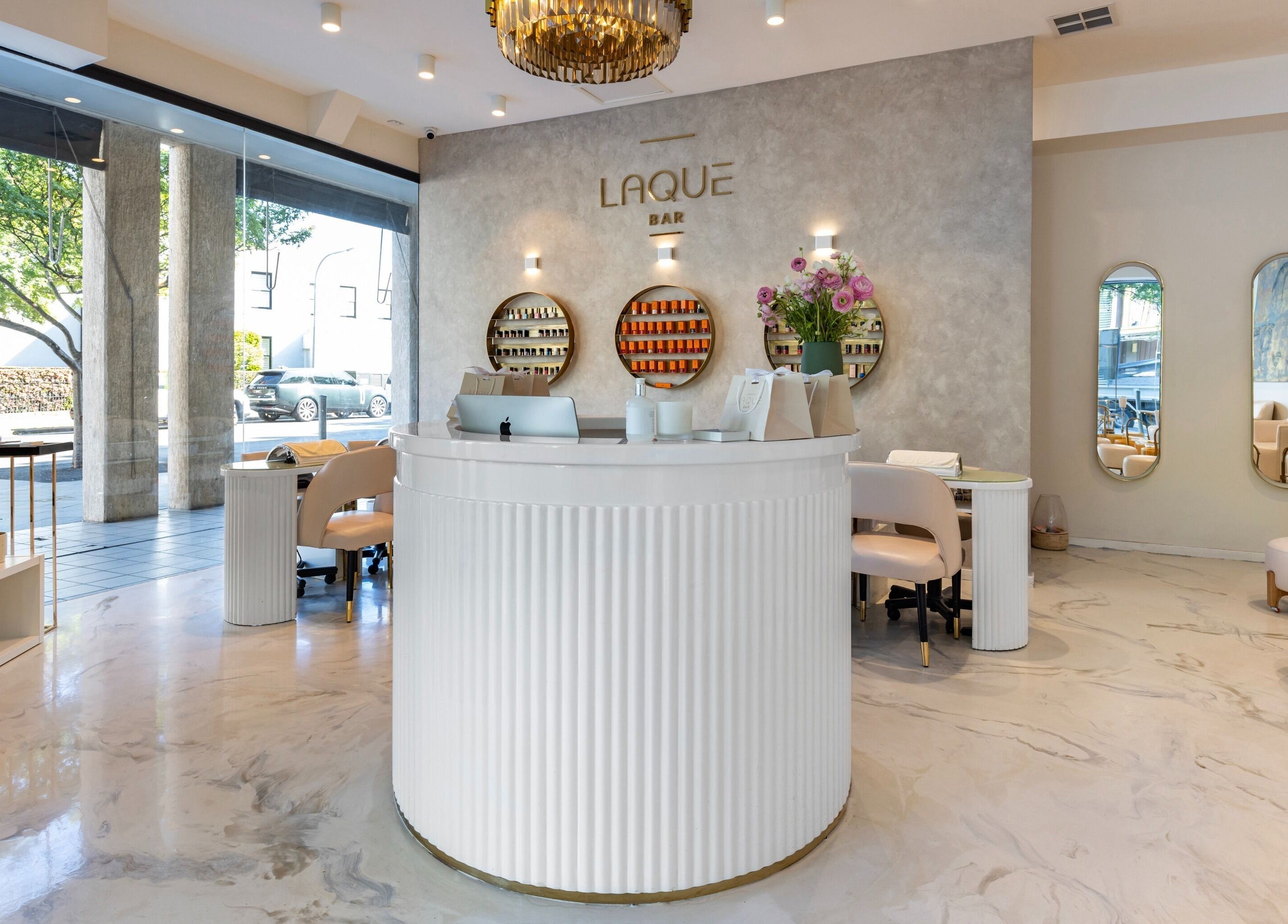 Laque Nail Bar - Double Bay reception area in Double Bay, NSW, AU with chic decor and nail polish displays.