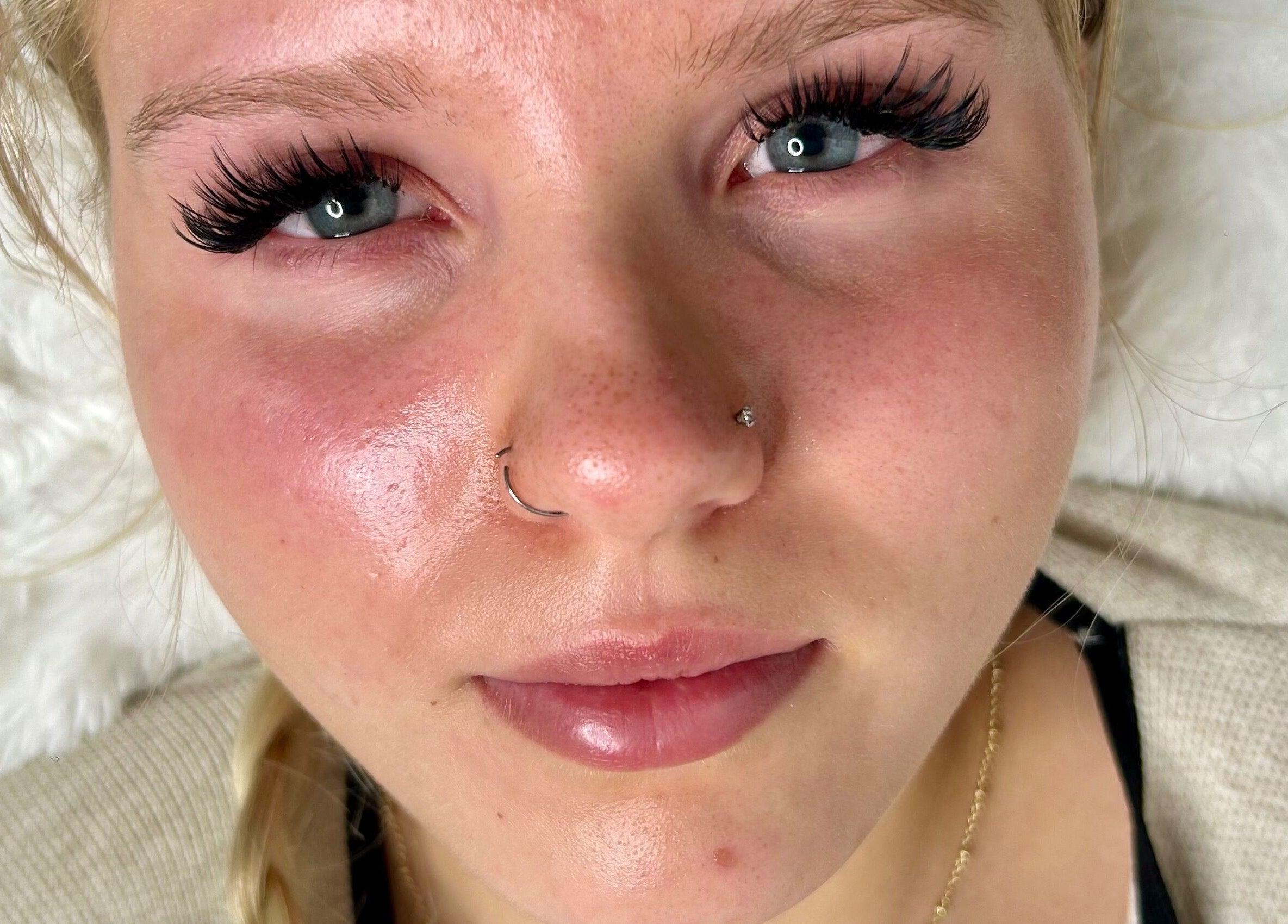 Close-up of a woman's face featuring eyelash extensions at Kayla the Brand, Manchester, England, GB.