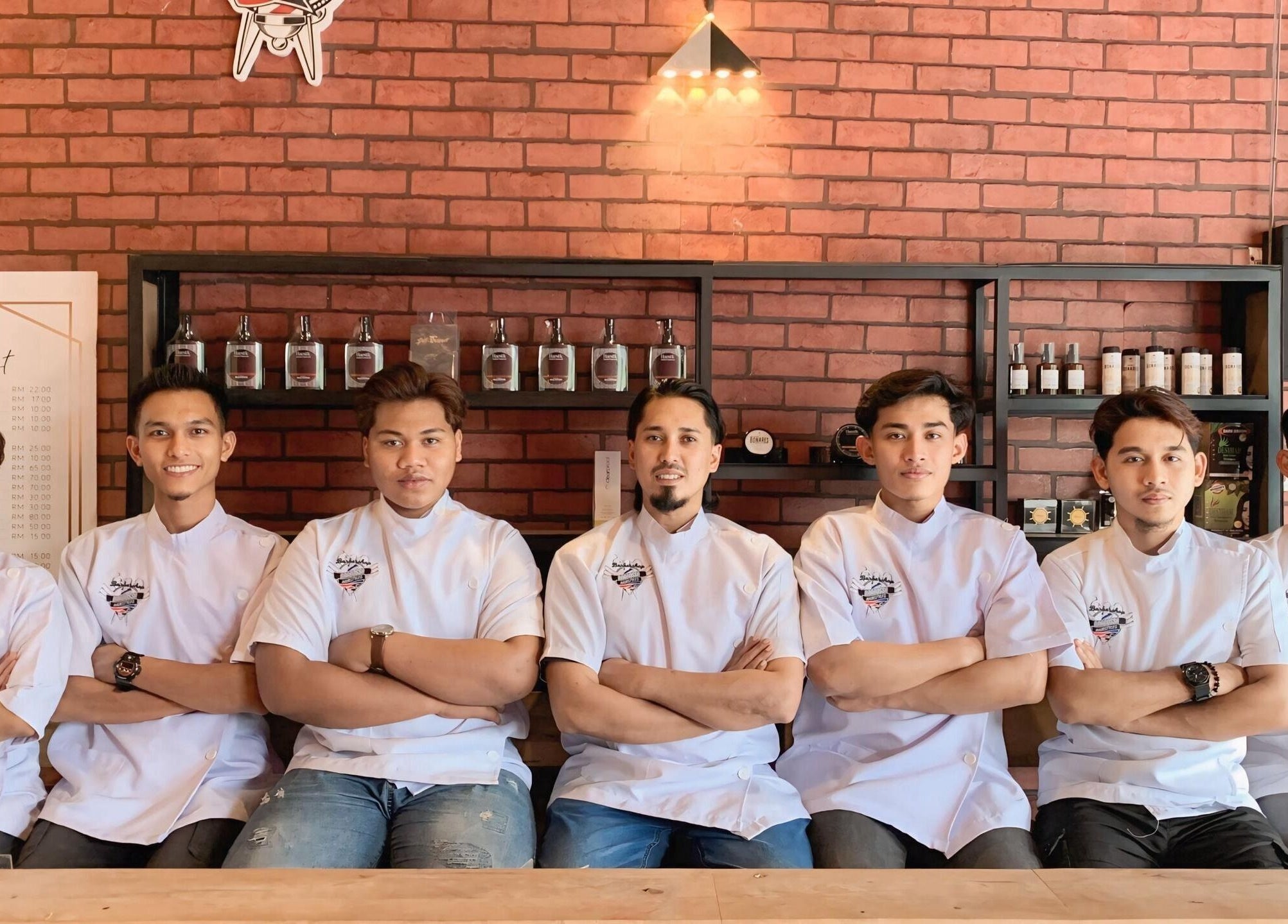 Team at Barbossa Barbershop & Hairstylist in Kulim, Kedah, MY, showcasing a modern aesthetic and professional vibe.