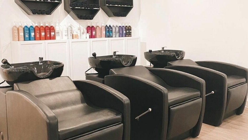 Modern wash stations at Hair Connection Cambridge, Cambridge, Ontario, CA. Stylish and comfortable salon setting.