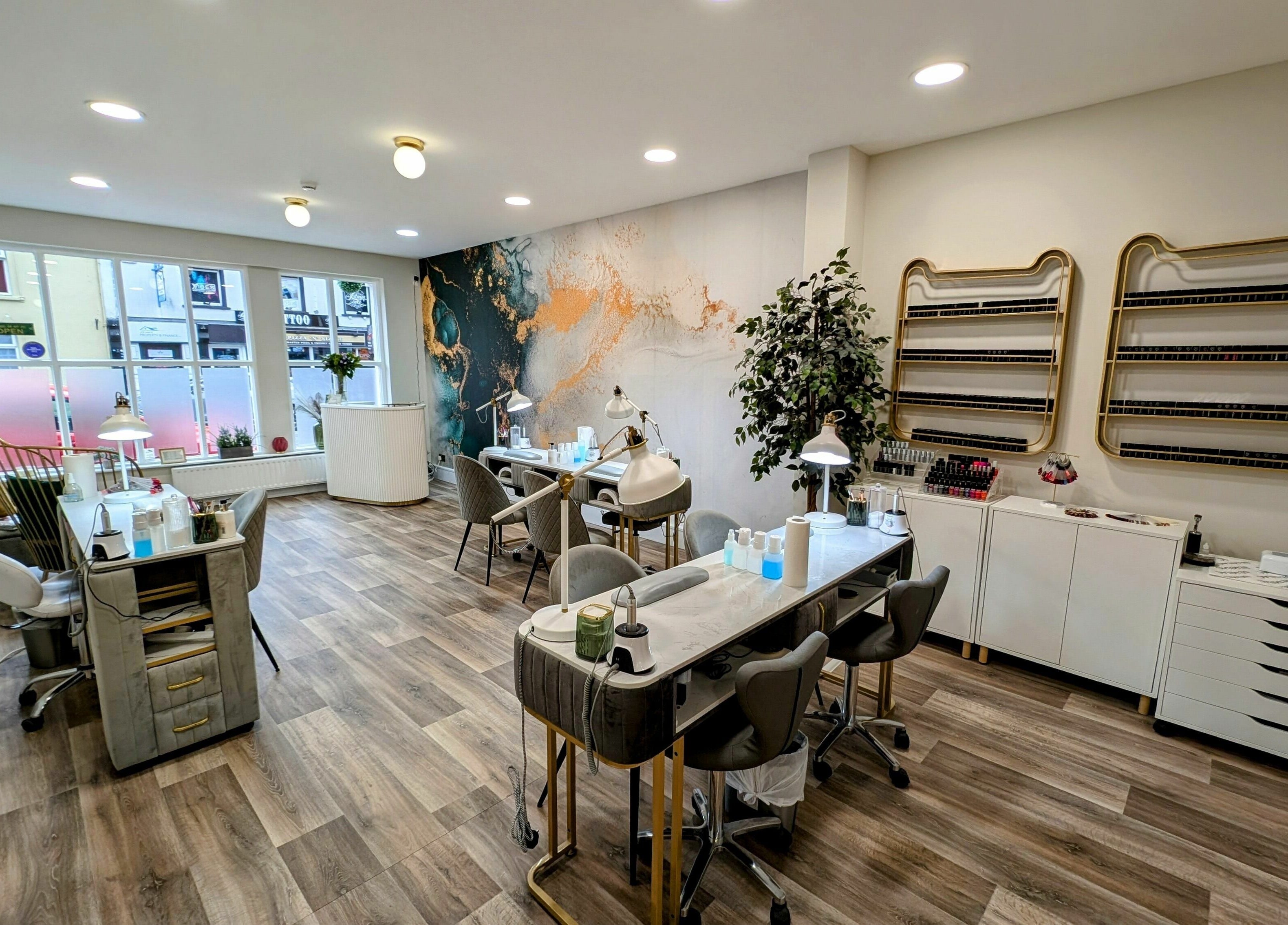 Modern interior of Mist Nail Bar in Carrigaline, County Cork, IE, featuring elegant nail stations.