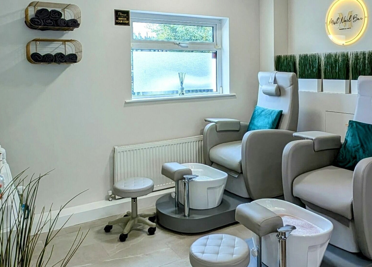 Comfortable pedicure chairs at Mist Nail Bar, Carrigaline, County Cork, IE offering a serene spa experience.