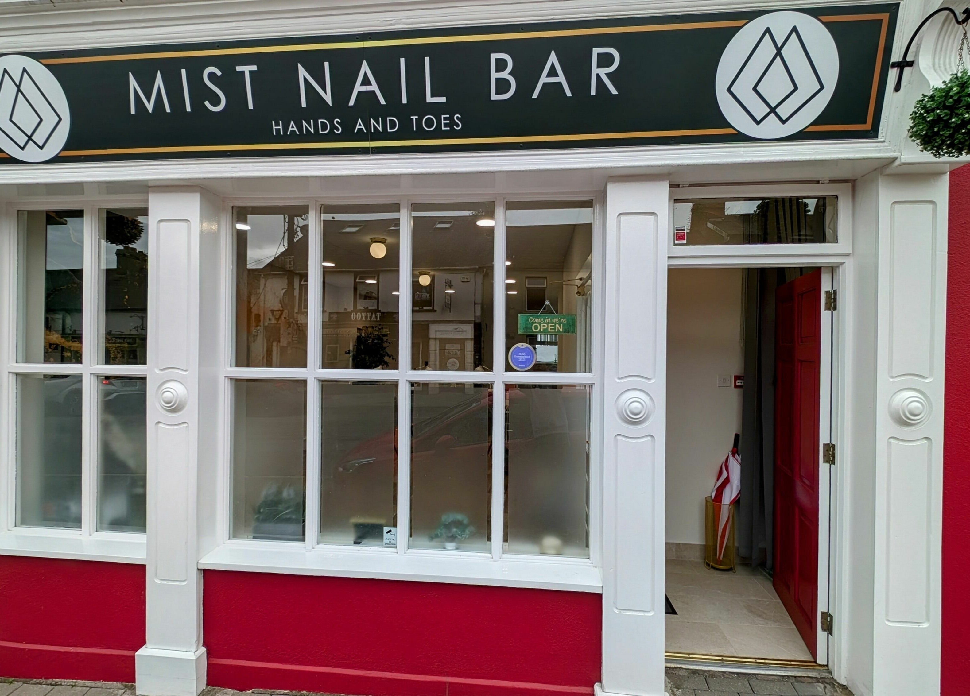 Front view of Mist Nail Bar in Carrigaline, County Cork, IE, with bright welcoming storefront.