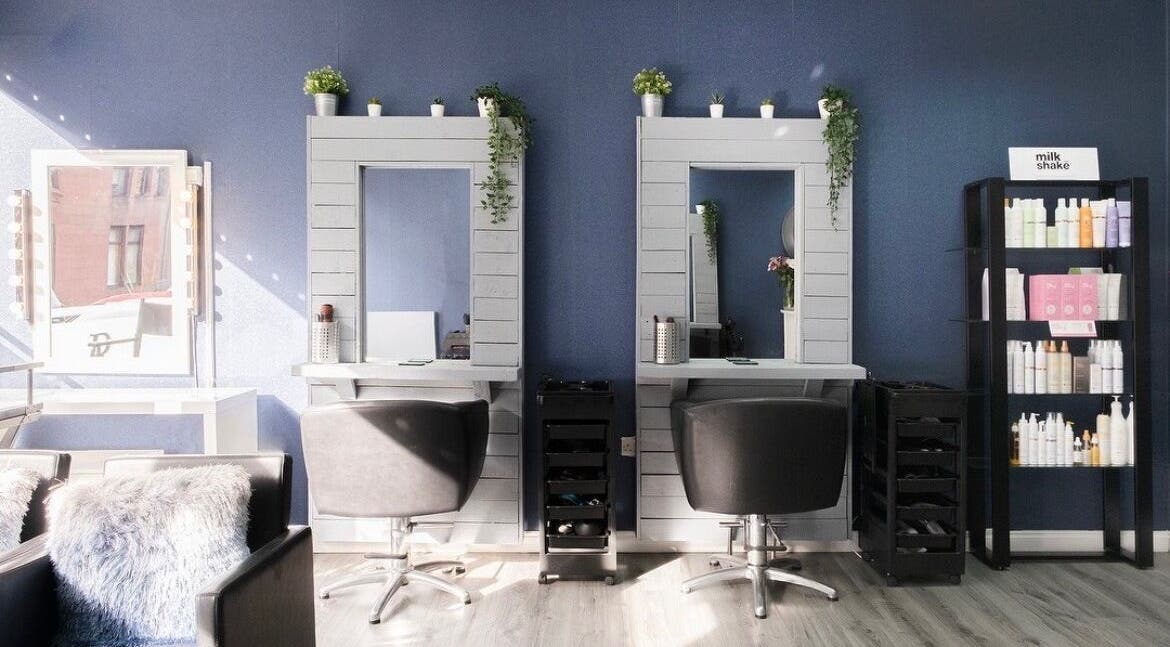 Elegant styling stations at Revive Hair, Beauty & Aesthetics, Glasgow, Scotland, GB, showcasing modern design.