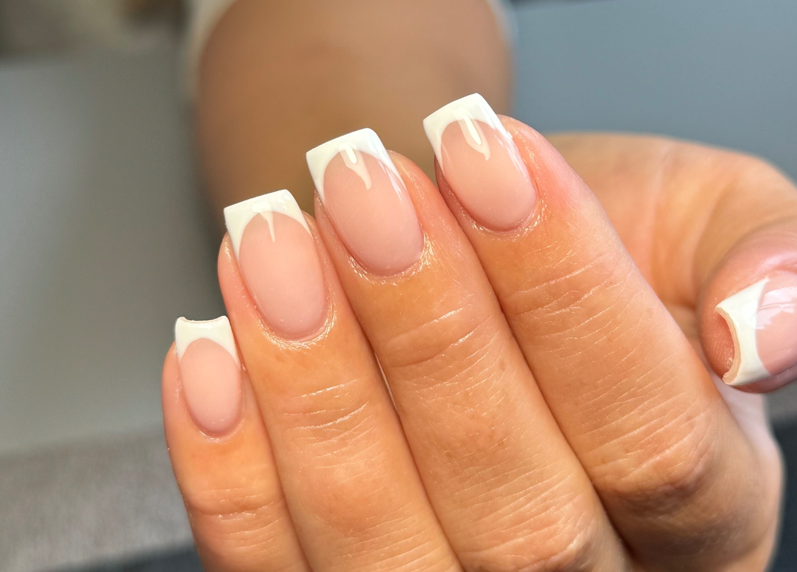 Chloe Elizabeth - Nails and Beauty in Helsby, England. Elegant French tip nails showcasing expert nail art.
