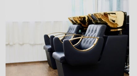 Luxurious salon chairs and gold basins at Nspyre Beauty, Bridgetown, Christ Church, BB.