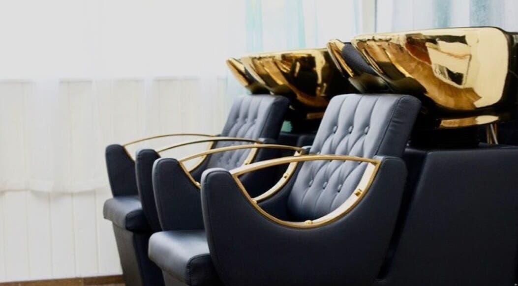 Luxurious salon chairs and gold washbasins at Nspyre Beauty, Bridgetown, Christ Church, BB.