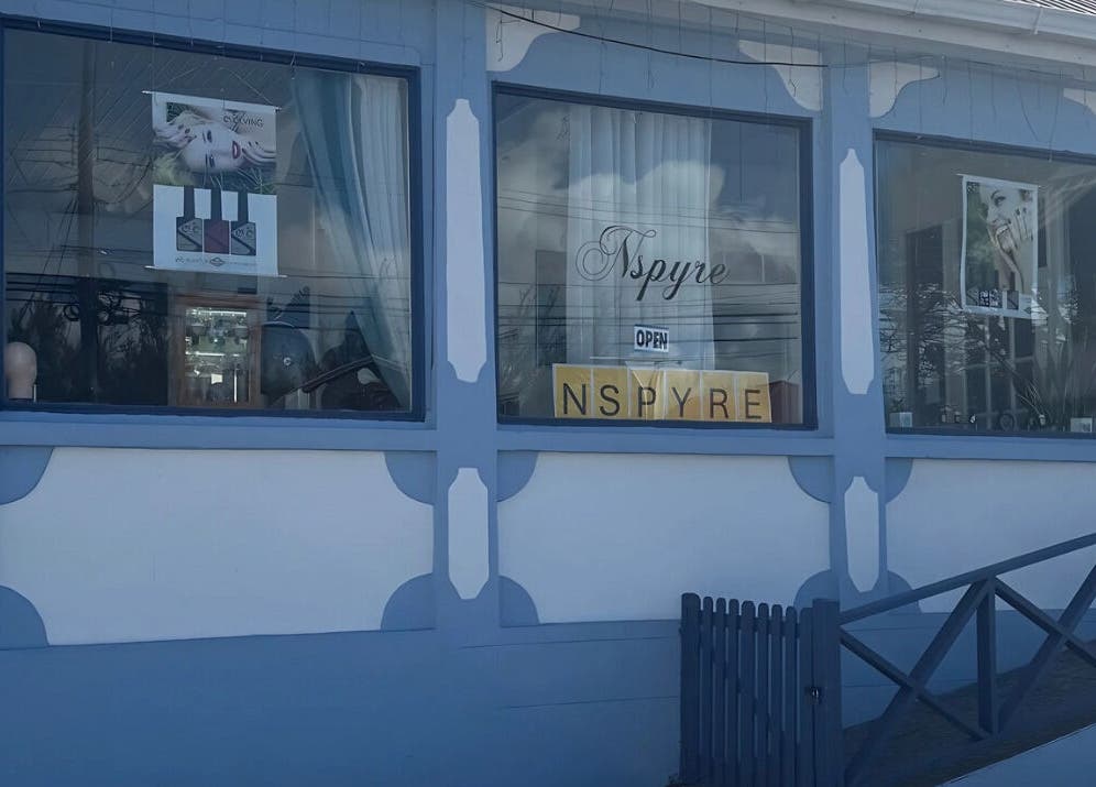 Exterior of Nspyre Beauty in Bridgetown, Christ Church, BB showcasing elegant storefront windows.