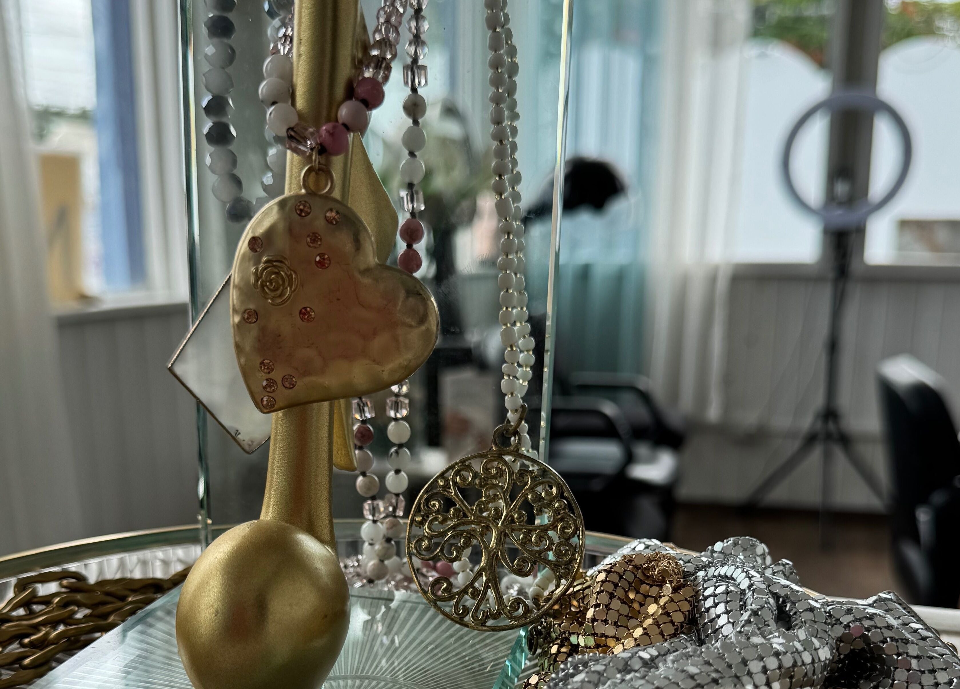 Elegant jewelry at Nspyre Beauty, Bridgetown, Christ Church, BB, enhancing the serene ambiance.