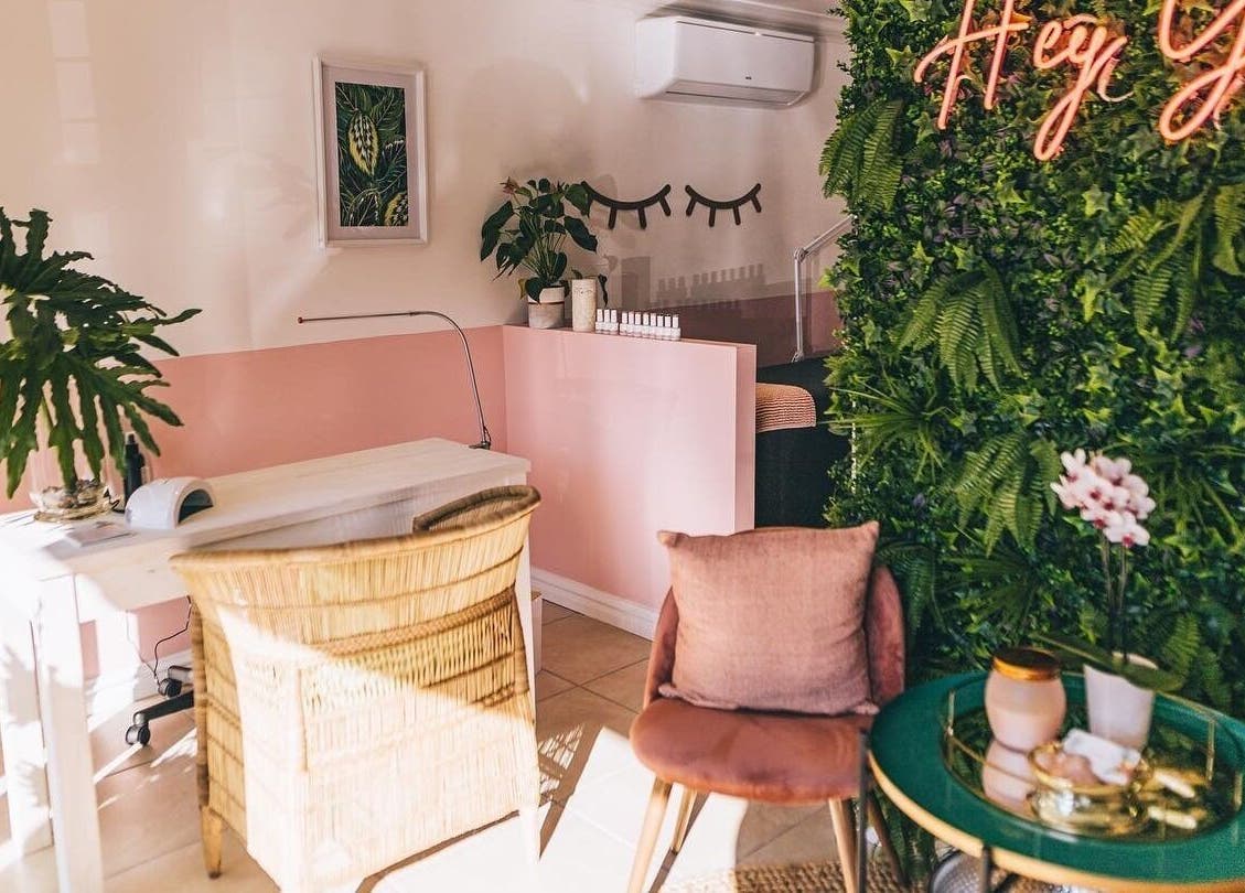 Bright and cozy corner at Lola’s Lash Artistry, Westville, KwaZulu-Natal, ZA with lush greenery and chic decor.