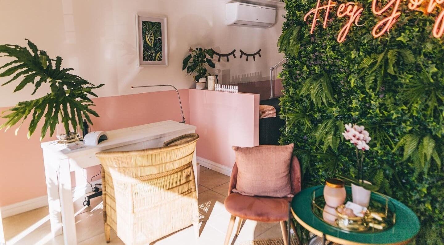Bright and cozy corner at Lola’s Lash Artistry, Westville, KwaZulu-Natal, ZA with lush greenery and chic decor.