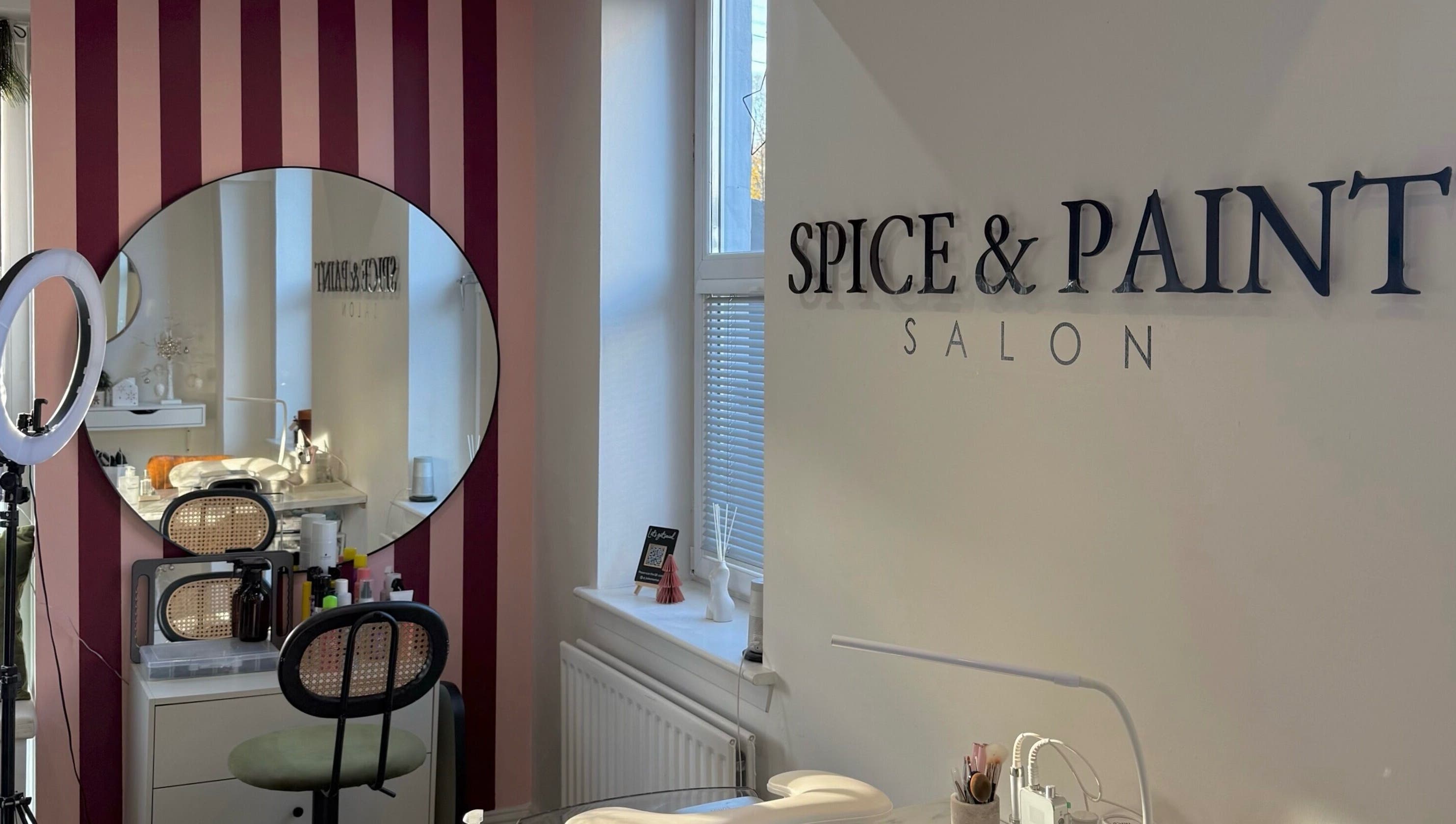 Spice and Paint Salon interior with mirror and chair, Bathgate, Scotland, GB.