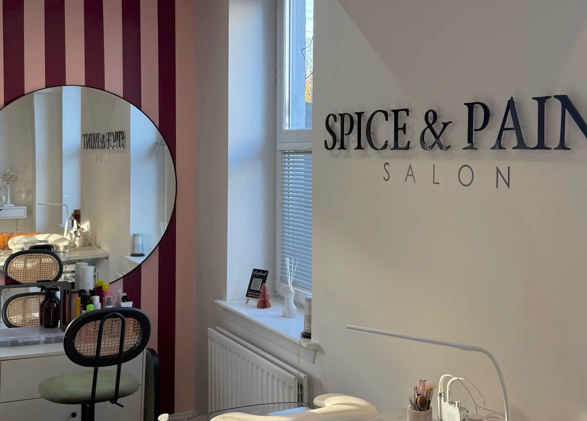 Spice and Paint Salon interior with mirror and chair, Bathgate, Scotland, GB.