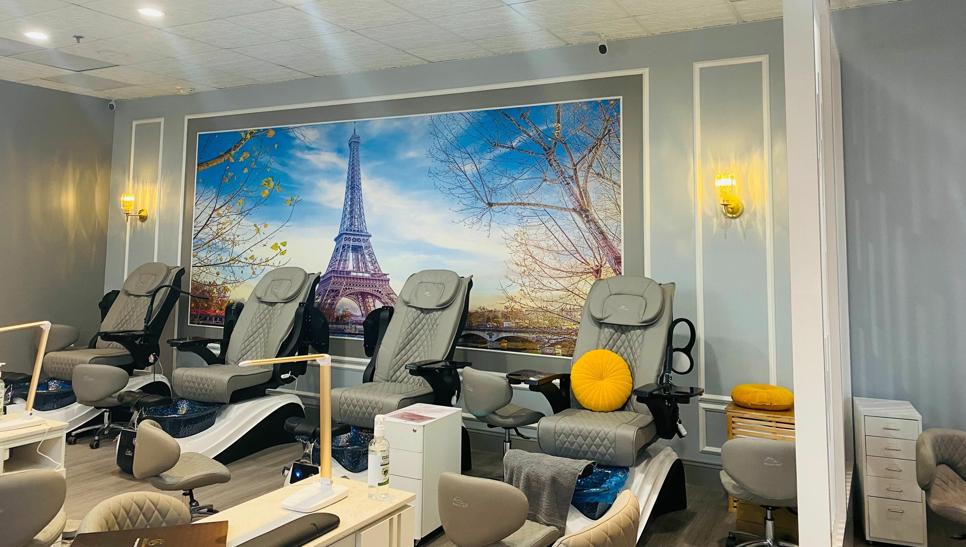 Bonjour Nail Bar's elegant pedicure station in Rancho Cucamonga, California, US with Paris-themed decor.