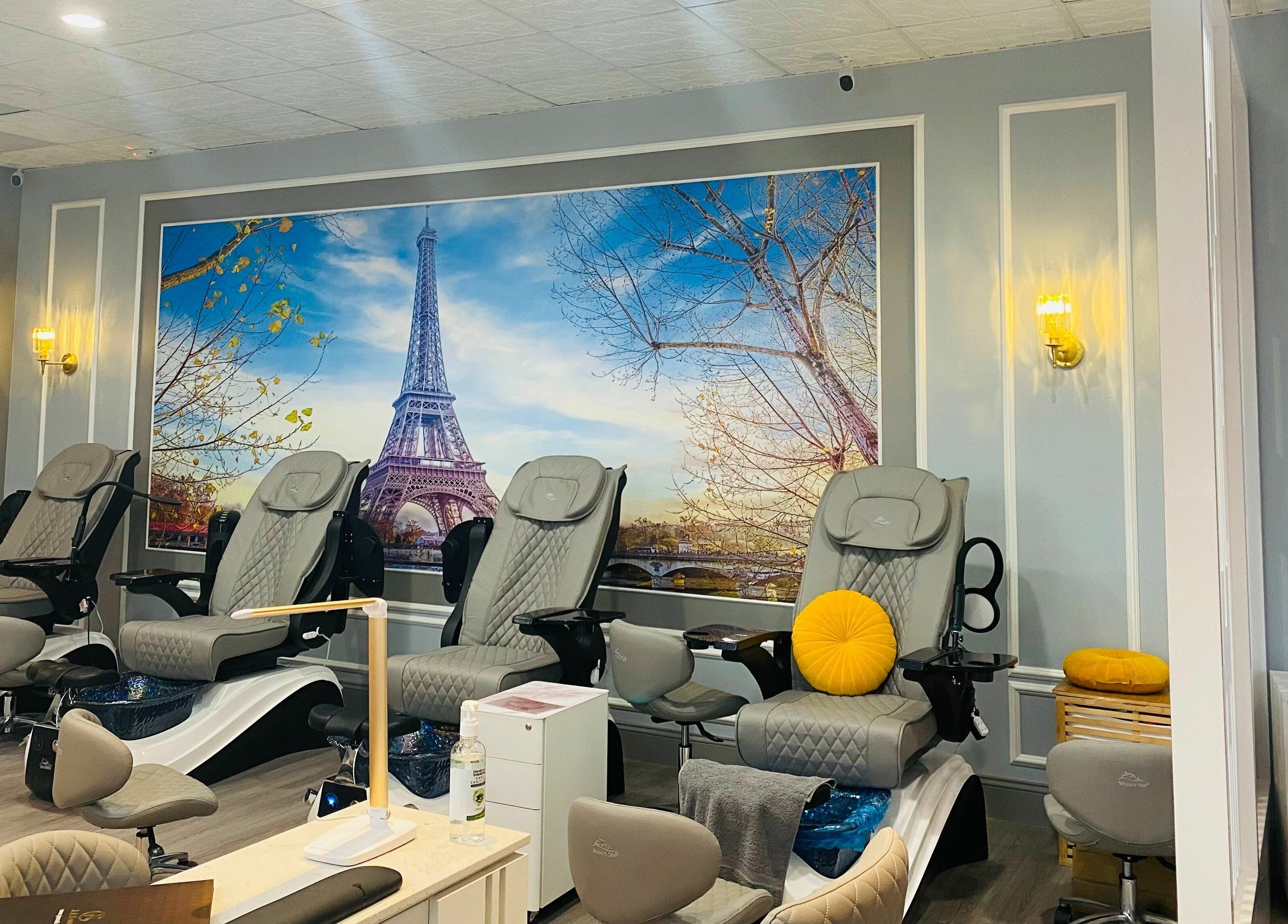 Bonjour Nail Bar's elegant pedicure station in Rancho Cucamonga, California, US with Paris-themed decor.