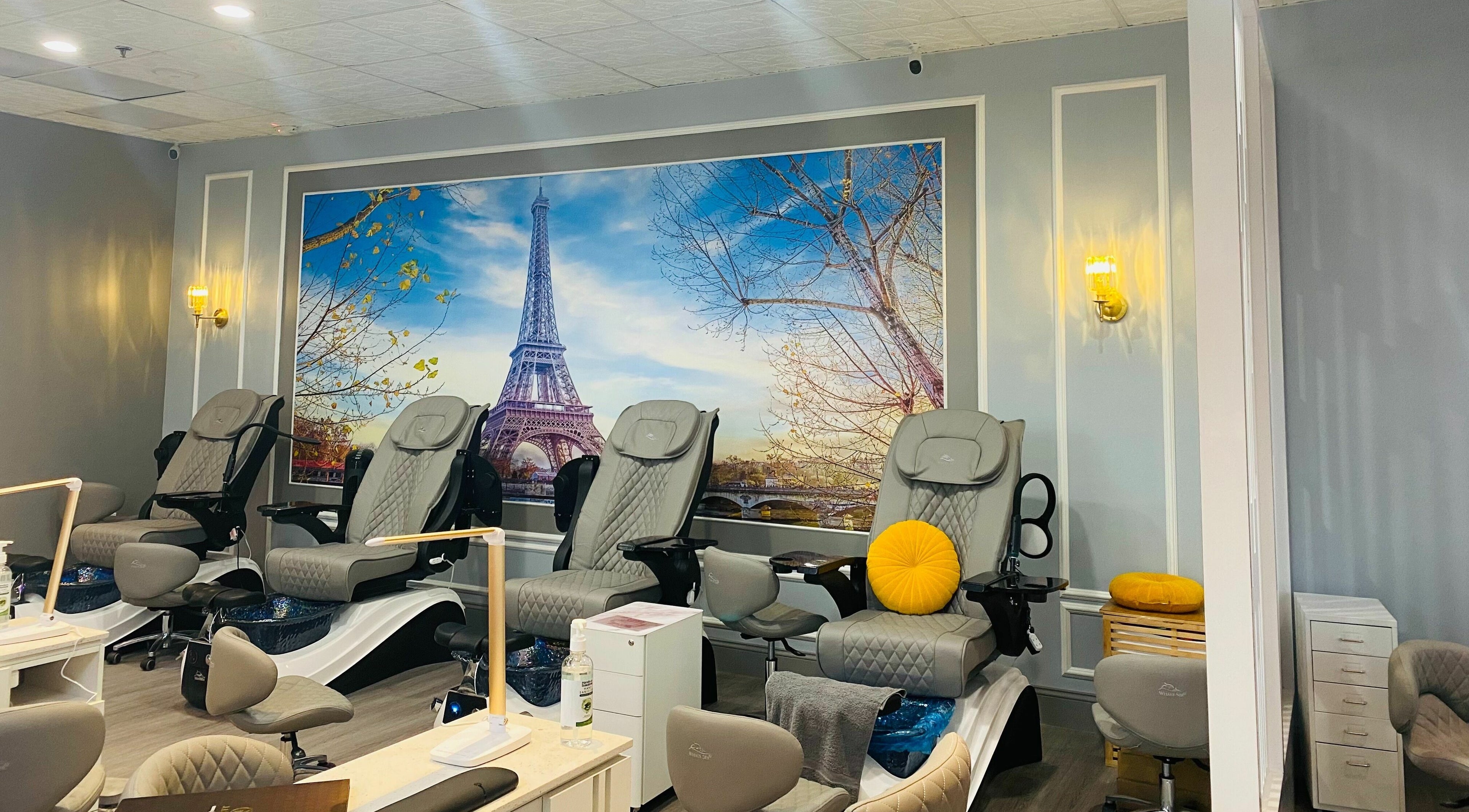 Bonjour Nail Bar's elegant pedicure station in Rancho Cucamonga, California, US with Paris-themed decor.