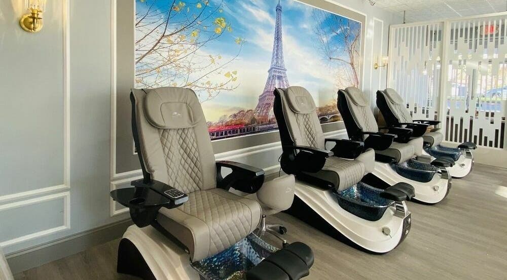 Luxurious pedicure chairs at Bonjour Nail Bar in Rancho Cucamonga, California, with a serene Paris backdrop.