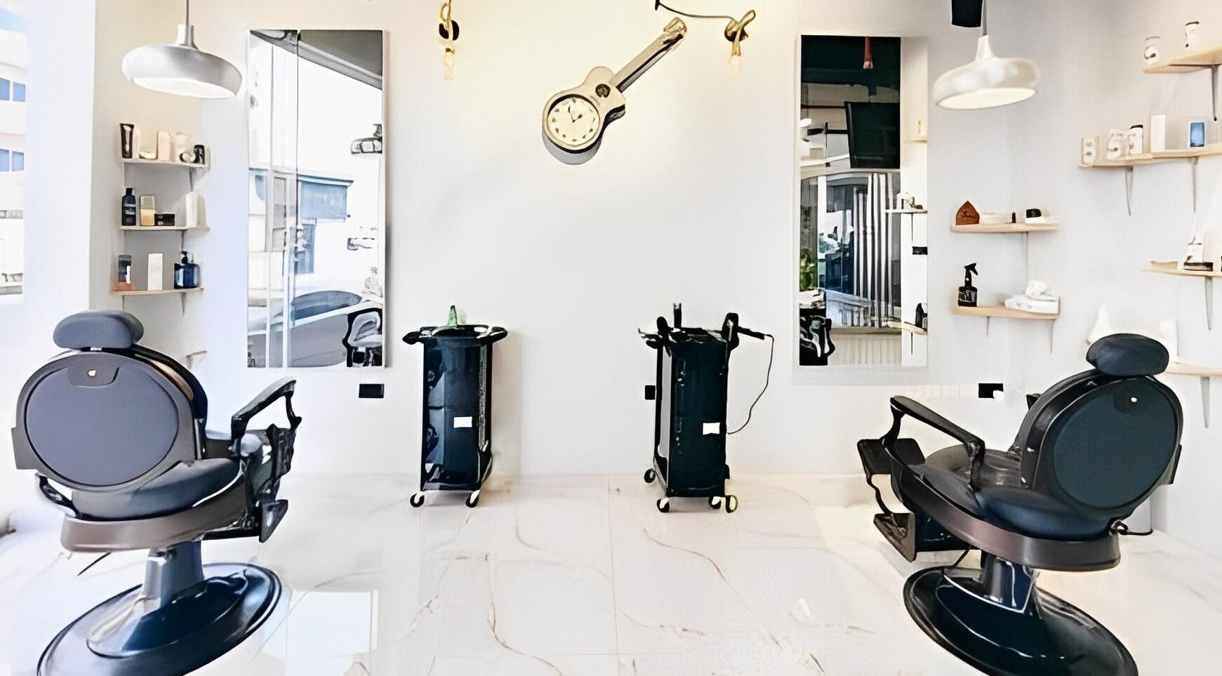 Interior of Blade & Beard Men Salon in Dubai, AE with stylish chairs and modern decor.