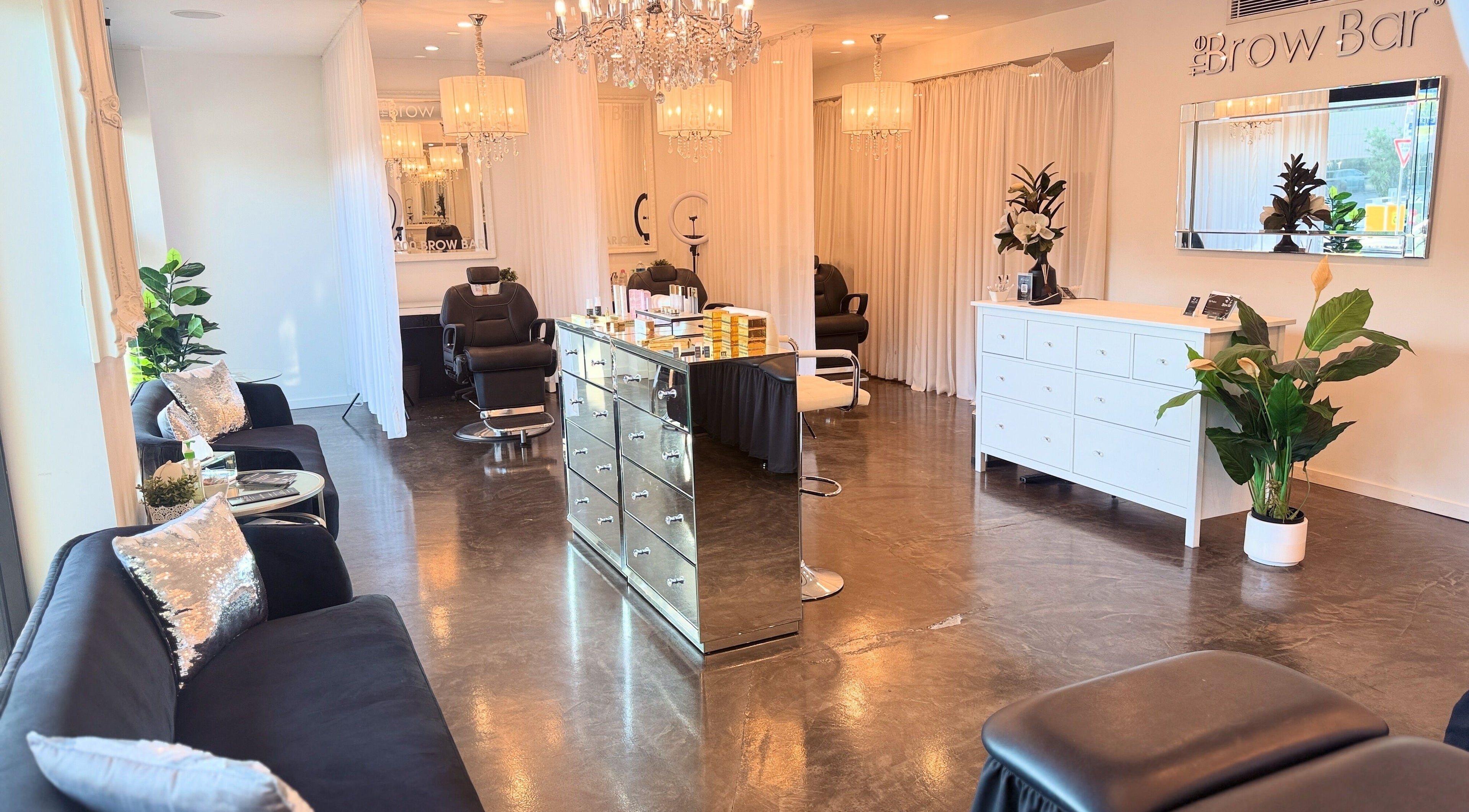 Luxurious interior of The Brow Bar Newstead, Newstead, Queensland, AU with chic decor and comfortable seating.