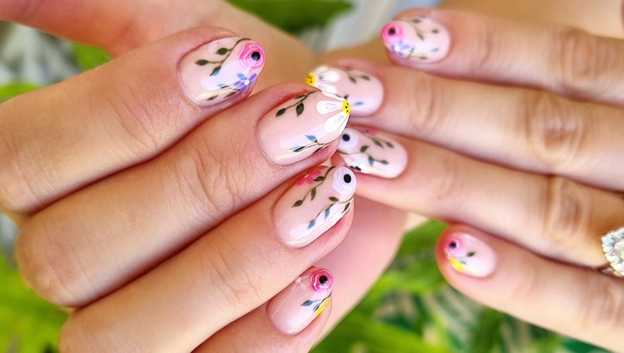 Floral nail art at Nails by Chanelle, Westville, KwaZulu-Natal, ZA showcasing delicate hand-painted designs.